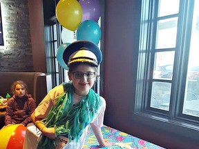 Keira Gayowsky, 11, wears her captain's hat at her Make-A-Wish reveal party. She is in the Caribbean with her family for a vacation. (Make-A-Wish photo)