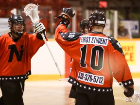 Owen Sound North Stars Brett Kloepfer, left, and teammate Stu Gordon celebrate a goal in this North Stars file photo. Gordon will now head the Senior B team from behind the bench. James Masters/The Sun Times.