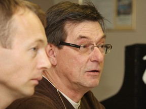 Sexual abuse victim Denis Beland, right, makes a point as lawyer Rob Talach looks on during a press conference in Sudbury in 2012. (John Lappa/Sudbury Star file photo)