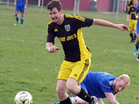 Wallaceburg Sting senior men's player Casey McGee fights for the ball during a Western Ontario Soccer League First Division game against London Marconi B at Kinsmen Park on Saturday, May 5. The game ended up in a 0-0 tie, with the Sting's Sam Youlton earning the shutout. It was the first regular-season game for the Sting.