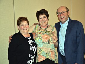 Elizabeth Giacinti (centre), a nurse in the dialysis clinic at Brantford General Hosptial, recently won an outstanding volunteer award from the Kidney Foundation of Canada. With her are Susan Tkachuk, of the foundation's Ontario board of directors, and Terry Young, the board's past president. (Submitted Photo by  Lori Carr-York)