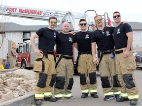 The Fort McMurray Fire Fighters Association raised more than $40,000 as part of their 2018 Rooftop Campout from May 2 to 5. For 75 hours, the five fire fighters stayed on the rooftop of the Tim Hortons in Eagle Ridge as they raised money for charity. From L-R: Matthew Heikel, Scott Germain, Adam Waldolf, Jerron Hawley, Derek Gervais. Vincent McDermott/Fort McMurray Today/Postmedia Network