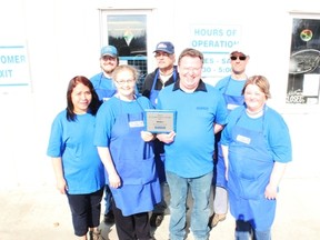 The employees of Melfort’s Sarcan depot; back (L to R) Nicholas Carlson, Gino Haidachuck and Donald Illsley; front (L to R) Linda Remonde, Carol Campbell, supervisor John Barks and Dorothy Shipley.