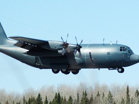 A C-130 Hercules transport aircraft is seen landing at the Victor M. Power Airport in Timmins in this March 2007 photo. The Canadian Armed Forces sent a Hercules to Kashechewan Monday morning to pick up some of the residents who had yet to be evacuated. The evacuation is underway due to the rising threat of flooding.
LEN GILLIS/Postmedia File Photo