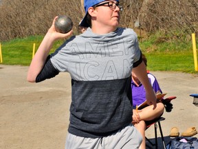 Dalton Devos of Valley Heights Secondary School takes part in midget boys shot put at the Valley Heights Secondary School Track and Field Day festivities on Tuesday. 
JACOB ROBINSON/Simcoe Reformer