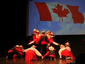 One of the final numbers in Glorious and Free was "Canadian Hoedown" with the image of the Canadian Flag flying in the background and all performers dressed in red and white.