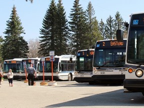 Stratford transit riders board buses at the downtown terminal on Tuesday, May 8, 2018 in Stratford, Ont. The city and its partner municipalities have been awarded provincial grants to boost inter- and intraregional transit. (Terry Bridge/Stratford Beacon Herald)