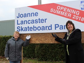 Joanne Lancaster (left), who spearheaded the fundraising efforts for the Wiarton skateboard park to be built in her name, with Janice Jackson, Mayor of South Bruce Peninsula, at the sign unveiling and ground breaking ceremony in Bluewater Park in Wiarton on Nov. 14, 2017. The skateboard park is slated for completion this summer. Photo by Zoe Kessler