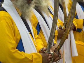 Sikh community members await the start of last year's Khalsa Day parade from the Sikh temple on Park Road North in Brantford. This year's celebration takes place on Sunday. (Expositor file photo)
