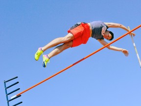 Delhi's Kyle Lewis takes to the skies during the DDSS Track and Field Meet on Tuesday. Lewis set the new DDSS senior boys pole vault record with a jump of 3.80m.
JACOB ROBINSON/Simcoe Reformer