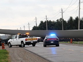 A rural road in Chatham-Kent is blocked as a turbine blade is transported to its destination in the former Chatham Township, in this file photo from August 2017. The Ontario Liberals have vilified Progressive Conservative leader Doug Ford for his remarks about developing the Greenbelt that surrounds the GTA, but why hasn’t Premier Kathleen Wynne expressed the same worry over the rest of Ontario where some of the best farmland in Canada has been pockmarked with wind farms? File photo/Postmedia Network
