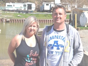 Sam Edwards, left, and her husband Greg Edwards own the North Erie Marina in Port Bruce. They are worried about a plan for a temporary bridge to be built at the end of Bank Street, one they say will scuttle their business. (Louis Pin/Times-Journal)