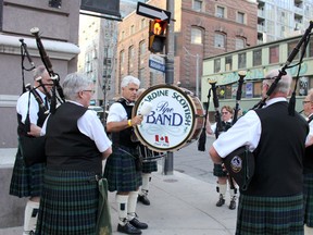 The Kincardine Scottish Pipe Band and Toronto Warm Up Party crew hopped on a bus and took the show on the road May 2, 2018 to represent Kincardine for the Kincardine Reunion Toronto Warm Up Party at Adelaide Music Hall. Pictured: The band is seen playing on the street corner downtown Toronto as the Kincardine Scottish Pipe Band represented the town for the Kincardine Reunion Toronto Warm Up Party. (Ryan Berry/ Kincardine News and Lucknow Sentinel)