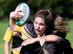 Blenheim Bobcats' Chloe Shaw is tackled by Northern Vikings' Cayleigh Beaton in the second half of an LKSSAA senior girls rugby game at Blenheim District High School in Blenheim, Ont., on Tuesday, May 8, 2018. The Vikings won 19-14. (Mark Malone/Postmedia Network)