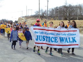 Photo by KEVIN McSHEFFREY/THE STANDARD
More than 300 students and staff from Our Lady of Lourdes and Our Lady of Fatima schools marched through Elliot Lake’s downtown area for their annual Walk For Justice.