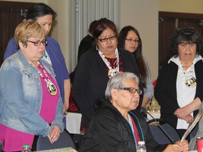 St. Anne residential school survivor Angela Shisheesh, seated, addresses the Nishnawbe Aski Nation Chiefs Spring Assembly at the Senator Hotel in Timmins Wednesday, where she expressed her disappointment with a court ruling that keeps transcripts from a previous hearing concerning abuse at residential schools sealed.
