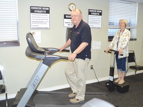 Photo by KEVIN McSHEFFREY/THE STANDARD
Larry Parker, Renaissance Active Living Centre vice-president, and Gail Crawford, president of the seniors group, display some of the items the centre has in its exercise room.