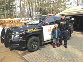 Photo supplied
Constable Phil Young with his nephew, Jacob.