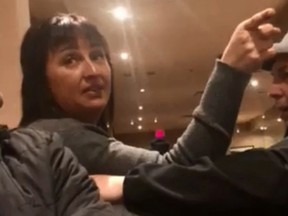 An unidentified woman engages in an argument with a group of patrons at a restaurant in Lethbridge, Alta., in this screengrab from an undated video posted on Facebook by Monir Omerzai. The mayor of Lethbridge is condemning a racist tirade caught on video at a local Denny's and says it does not reflect the southern Alberta city's attitude toward newcomers. THE CANADIAN PRESS/HO - Facebook, Monir Omerzai