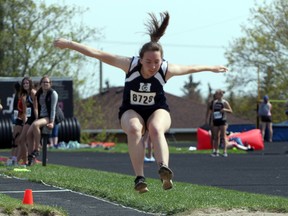 St. Mary's Warriors Kaitlyn Vermeersch jumps during the junior girls' long jump in Woodstock, Ont. on Wednesday May 9, 2018 at the 3rd annual Woodstock Classic track and field meet. The event had 24 schools and 705 athletes compete. Greg Colgan/Woodstock Sentinel-Review/Postmedia Network