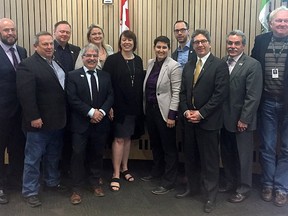 Saffron Centre executive director Katie Kitschke (centre) poses with council and Strathcona MLA Estefania Cortes-Vargas (left of centre) after learning of council's approved $150,000 grant to Saffron. Left to right: Councillors Dave Anderson, Paul Smith, Robert Parks, Bill Tonita and Katie Berghofer, Kitschke, Cortes-Vargas, Coun. Brian Botterill, Mayor Rod Frank, and councillors Linton Delainey and Glen Lawrence.

Photo Supplied