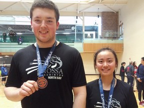 West Ferris Trojans Adam Wallace and Jessie Zhou won bronze after a three-game battle in the B mixed doubles OFSAA badminton championships in Windsor, Wednesday.