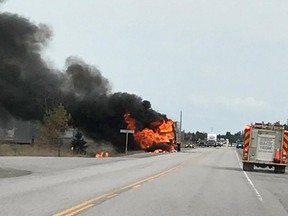 A tractor-trailer bursts into flames Wednesday on Highway 17 near Warren. No injuries were reoprted. (OPP photo)