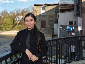 Actress Ana Golja takes a break between scenes on the set of The Cuban, which has been filming in Brantford and Brant County for the past several weeks. Shooting took place at 2 Rivers Restaurant in downtown Paris on Thursday. (Brian Thompson/The Expositor)