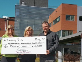 Foundation of Chatham-Kent Health Alliance executive director Mary Lou Crowley, left, receives a $10,000 cheque from Tricia and Mike Montminy towards the purchase of new diagnostic imaging equipment for the CKHA. (Handout/Postmedia Network)