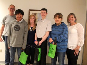 Beaver Brae Secondary School is in its third year of partnership with Kenora Association Community Living for the special education co-op program, which sees students like Drake Loon (second from left), Justin Durand (centre) and McKenzie Adams (second from right) placed in work environments at local businesses. SHERI LAMB/Daily Miner and News/Postmedia Network