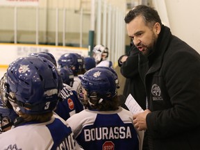 Shawn Frappier, head coach of the AAA Sudbury Wolves Minor Midgets, barks out instructions during a hockey game at McClelland arena in Copper Cliff, Ont. on Friday December 23, 2016. John Lappa/Sudbury Star/Postmedia Network