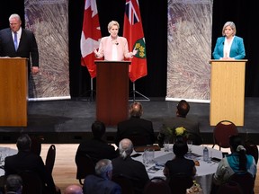 Ontario Progressive Conservative Leader Doug Ford, left to right, Ontario Liberal Leader Kathleen Wynne and Ontario NDP Leader Andrea Horwath take part in the second of three leaders' debate in Parry Sound, Ont., on Friday, May 11, 2018. THE CANADIAN PRESS/Nathan Denette