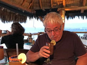 Gerry Clark drinks a michelada.