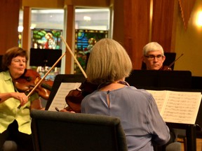 Four of the Stratford Symphony Orchestra's five-member viola section performed prior to the orchestra's 14th season launch event Friday evening. (Galen Simmons/The Beacon Herald)