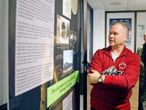 Warrant Officer Stephen Jaworski checks out one of the graphic panels included in a new exhibit launched Friday at the Canadian Forces Museum of Aerospace Defence at CFB North Bay called Below! NORAD's Underground Fortresses. 
Gord Young/The Nugget
