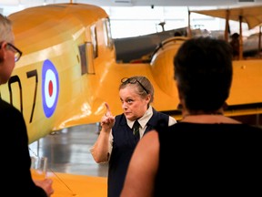 Tim Miller/The Intelligencer
Actress Christina Gordon, in her role as a flight instructor, waves an admonishing finger at one of the guests to the Trenton Military Family Resource Centre's Invisible Ribbon Gala at the National Air Force Museum of Canada on Saturday. This year's gala theme was A Night at the Museum.