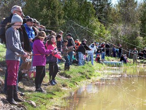 About 120 children took part in the free fishing day near Bognor Saturday. DENIS LANGLOIS/THE SUN TIMES