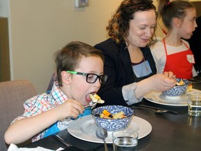 Callum Kyle, 7, and mom Jenn test out their creations at Stratford Chefs School’s Kids Can Cook open kitchen session on Saturday, May 12, 2018 in Stratford, Ont. Terry Bridge/Stratford Beacon Herald/Postmedia Network