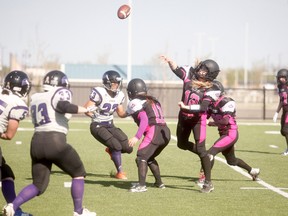 Gordon Anderson/Daily-Herald Tribune
Northern Anarchy quarterback Celine Mousseau lets a pass fly during the first quarter of Western Women’s Canadian Football League action at CKC Field on Saturday night. The Anarchy dropped an 82-0 decision to the Lethbridge Steel. The club is off next weekend before resuming regular-season play with a May 26 road game against the Calgary Rage.