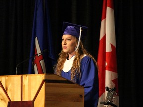 JOSHUA SANTOS/DAILY HERALD-TRIBUNE
Haley Friesen, class of 2018 ambassador reflected on her time at Peace Wapiti Academy during the graduation ceremony at the ENTREC Centre in Evergreen Park on Saturday.