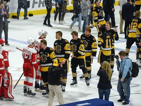 The Soo Greyhounds congratulate the Hamilton Bulldogs Sunday afternoon after the Bulldogs clinched the OHL championship series with a 5-4 win in Game 6 on home ice, ending the Hounds’s season and any chances for a 2018 Memorial Cup. Gary Yokoyama/Hamilton Spectator