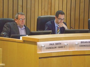 Coun. Paul Smith (left) was the lone vote against the elimination of council priority funds — discretionary community funds to be handed out by elected officials to community initiatives — while Coun. Brian Botterill (right) pitched changes to existing priority fund guidelines. The debate will return to council at a future meeting.

File Photo