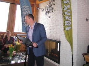 Jack Evans/For The Intelligencer
Festival Players of Prince Edward County artistic director Graham Abbey stands under a festival banner in the Drake Devonshire Inn at Wellington as he announced plans for the coming summer season.