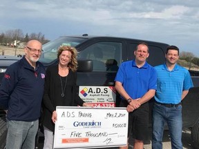 Revitalization Committee members accept a cheque from Greg Aitken on behalf of A.D.S. Asphalt. (Contributed photo)