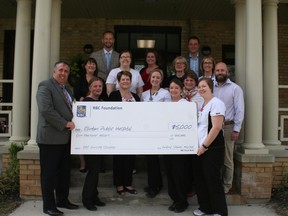 RBC representatives and Clinton Public Hospital staff gathered at the Main Entrance of Clinton Public Hospital last Wednesday for the cheque presentation. Front/bottom row (ground level) left to right: Dan Woods (RBC Regional Vice President, Central Shores); Robyn Guest (RBC Mortgage Specialist); Shelby King (CPH Inpatient RN) and Laurie Hakkers (CPH RN Team Lead). Second row (first step) left to right: Marj Wise (RBC Community Manager); Kirsten Allan (Inpatient RN), Penny Cardno (Director of Patient Care), Michael Fleming (Interim Manager CPH). Third row (second step) left to right: Deanna Martin (RBC); Rebecca Scott (Inpatient RPN), Mary Cardinal (Vice President, Quality & Chief Quality Executive), Anne Campbell (Vice President, Partnerships & Chief Nursing Executive). Back row (top step) left to right: Lincoln Simmons (RBC Vice President, Commercial); Darlene McCowan (Clinton Public Hospital Foundation Co-ordinator); Clive Slade (RBC Commercial Account Manager).