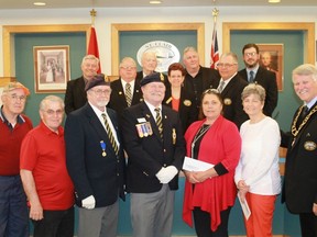 Groups from across St. Clair Township received grants from the township council prior to council's May 7 meeting, funds allocated from the township's most recent budget. Representatives from the Corunna Legion, the Brigden Park Committee, the Rock of Honour Project, the Sacred Heart Food Bank and the Corunna Community Safety Committee attended the cheque ceremony. 
CARL HNATYSHYN/SARNIA THIS WEEK