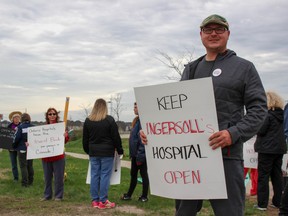 West Hamilton holds his picket sign outside of the Woodstock General Hospital on Saturday, May 12 in favour of better medical care in Ontario and in Oxford. (Chris Funston/Sentinel-Review)