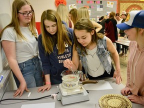 Students from Mayerthorpe High learn to make their own lip balms at the Tiger Summit on May 8. (Taryn Brandell | Mayerthorpe Freelancer)