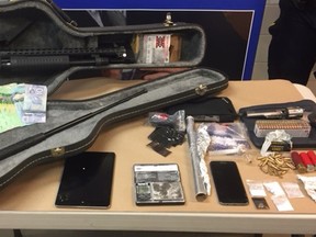 PHOTO SUBMITTED
RCMP officers seized two firearms, ammunition and drugs, including cocaine and methamphetamine on May 8.