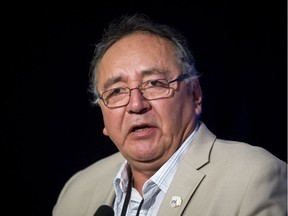 Fort McKay Chief Jim Boucher delivers a keynote speech during the Pipeline Gridlock Conference at the Hyatt Regency in downtown Calgary, Alta., on Monday, Oct. 3, 2016. The conference joined First Nations leaders with industry and government representatives to discuss issues facing oil pipelines. Lyle Aspinall/Postmedia Network